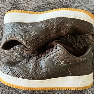 Brown perforated leather with gold Nike Air details